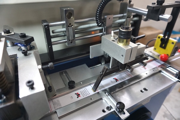 magnetic pusher for printed labels